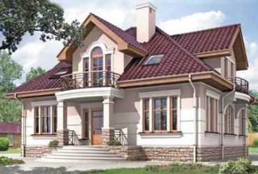 Двухэтажный дом из газобетона 12х12 м с фигурной крышей